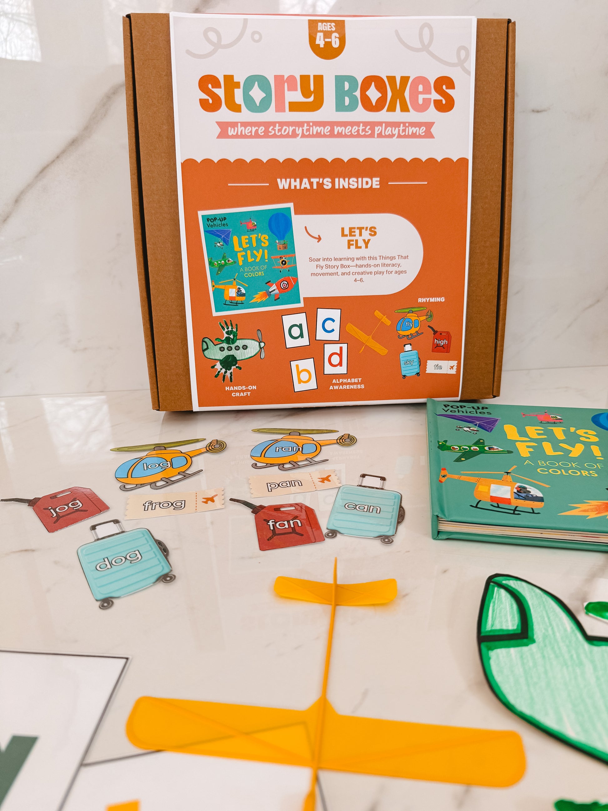 Story Boxes educational product with books and cutouts on a light surface