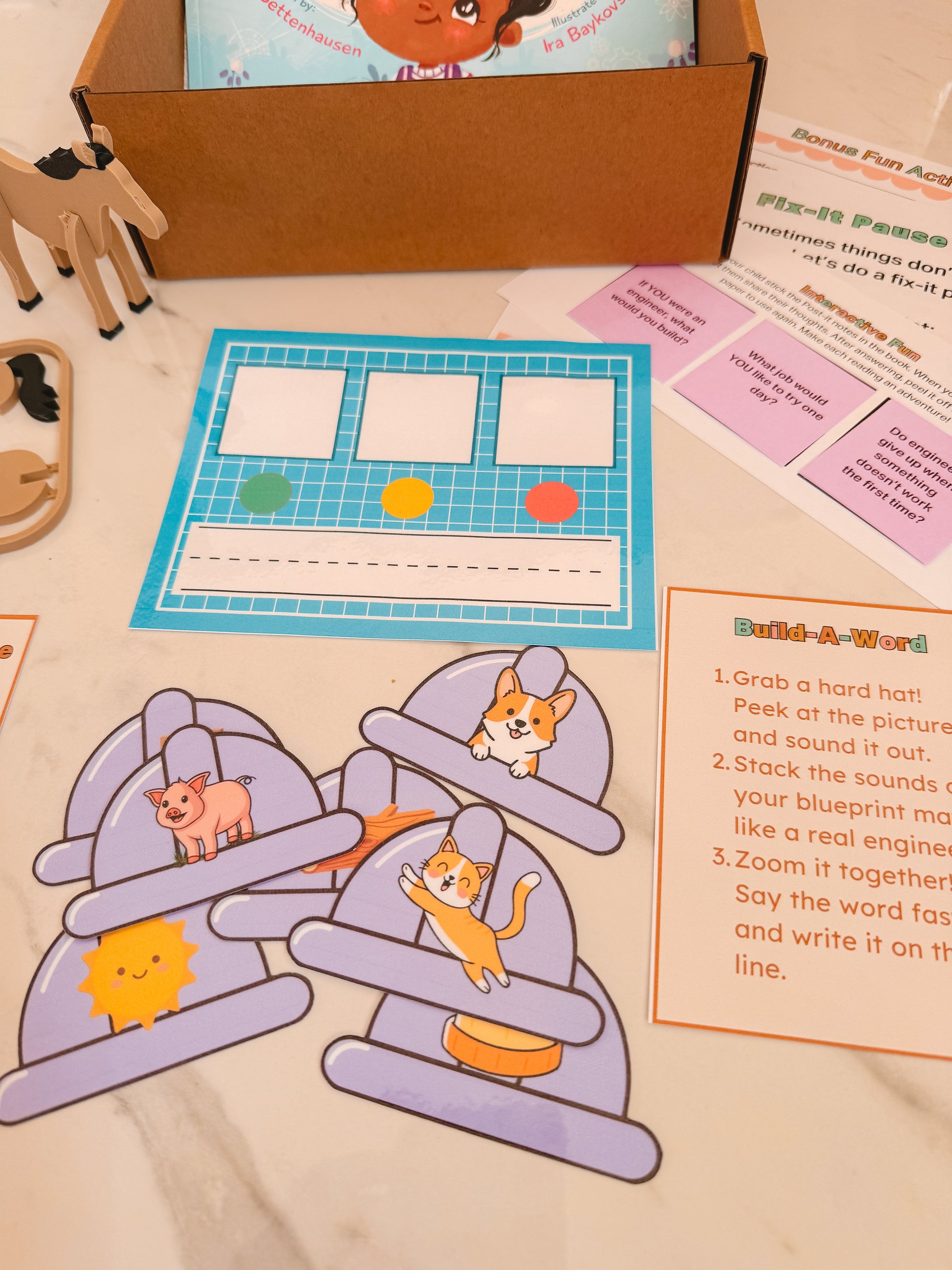 Educational materials including a worksheet and puzzle pieces on a table.