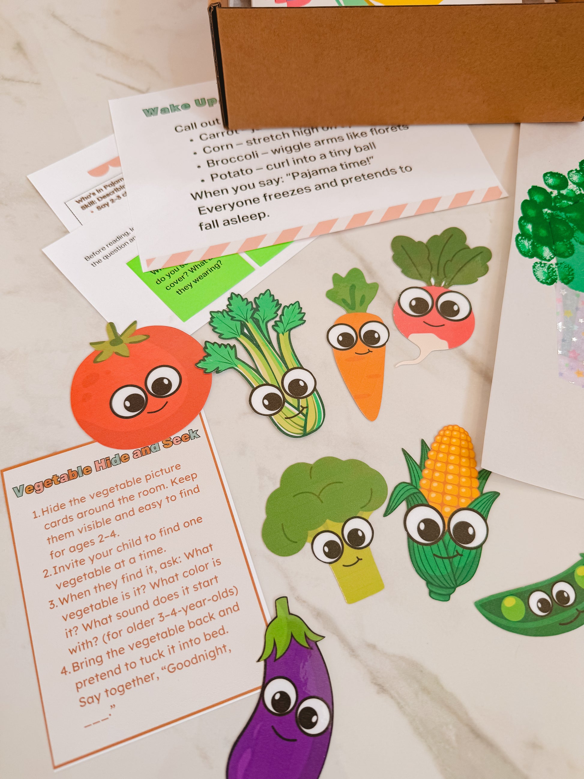 Colorful vegetable-themed stickers with eyes on a white surface